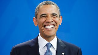 Barack Obama wird zur Fotobombe