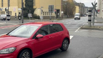 Verkehrsrecht: Wann liegt ein Rotlichtversto&szlig; nach &Uuml;berfahren der Haltelinie bei Gr&uuml;n vor?